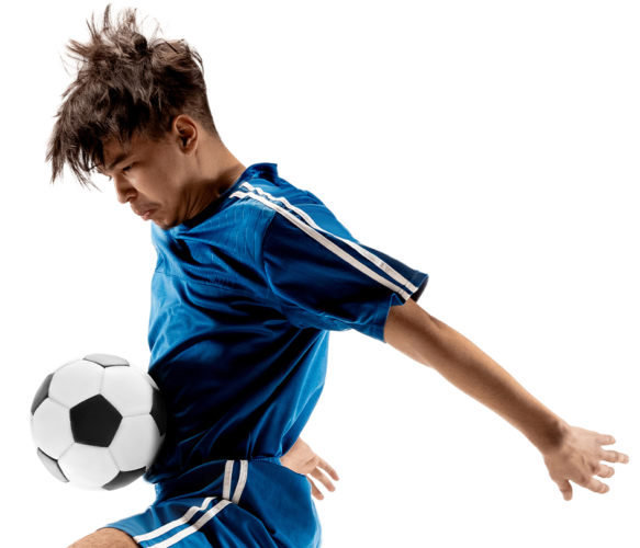 Boy In A Blue Football Top With Football