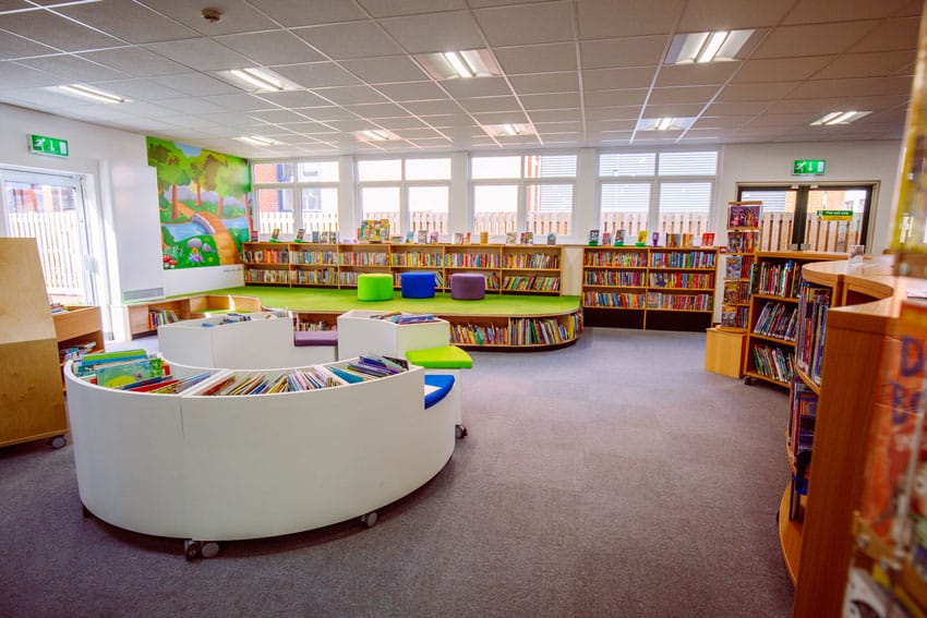 The childrens' book section at an Aura Wales Library